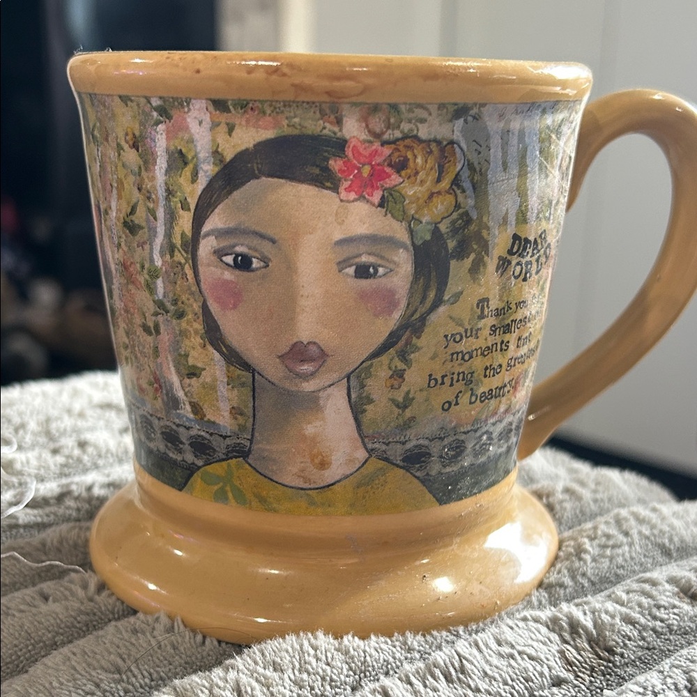Kelly Rae Robert’s Charming Tan Ceramic Mug with Artistic Portrait